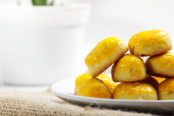 Stack of 'nastar', cookies that made from pineapple jam, shoot on white background