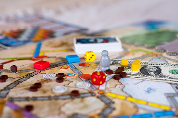 Board games, coins, bills, dice and cards