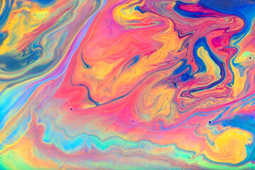 Colorful fluid art pink and blue background.