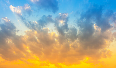 sky and clouds nature background,bright orange sunset light on blue sky with cloudy
