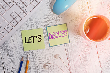 Handwriting text writing Lets Discuss. Conceptual photo to talk about something to reach a decision...