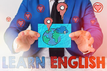 Writing note showing Learn English. Business concept for to train writing and speaking, focusing on...