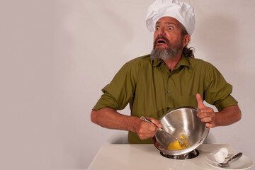 funny chef acting with vegetables