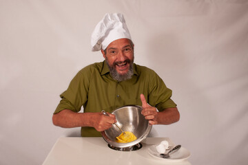 funny chef acting with vegetables