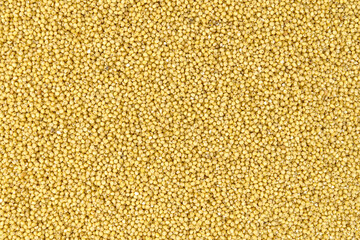 A scattering of millet porridge grains top view