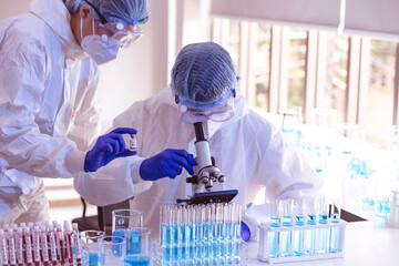 Scientists and researcher doing research for finding coronavirus, covid-19 vaccine disease...