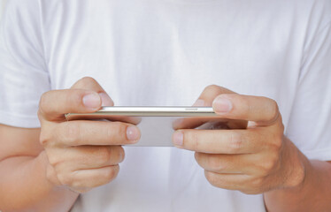 hand holding a smartphone.