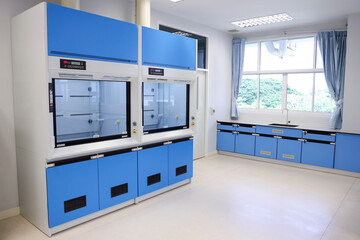 Laboratory fume hoods in science classroom interior of university college for protect the user from inhaling toxic gases (fume hoods, biosafety cabinets, glove boxes).