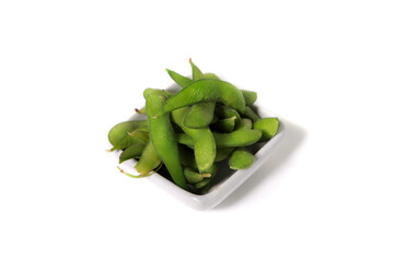 green soybeans on white background