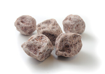 salted plum on white background.