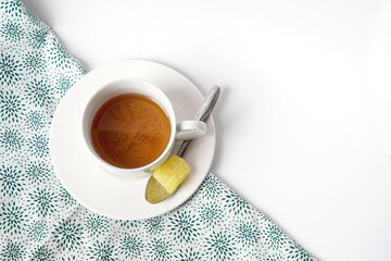 Fresh a cup of tea with rock sugar and tea spoon