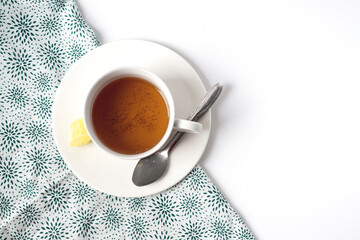 Fresh a cup of tea with rock sugar and tea spoon