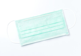 Used medical masks on a white background