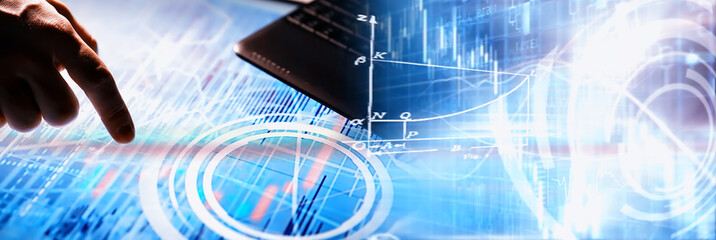 Business concept. Information technology and data processing. Hands over the screen with graphic data. A modern software product in business.