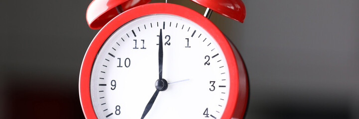 Close up table red alarm clock meeting deadlines. An alarm clock helps to oversleep right time and...