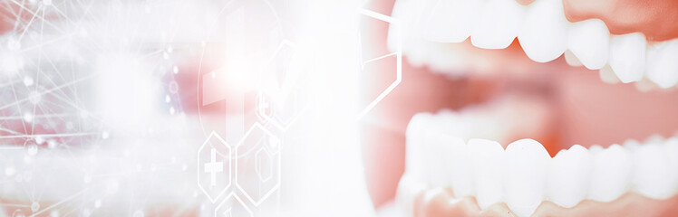 Dentist's office. Dentist examines the oral cavity before treatment. The doctor shows a course of treatment. Caries jaw treatment. Implantation and installation of veneers.