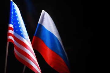 The concept of diplomatic relations. Flag of the Russian Federation and partner. Sanctions pressure...