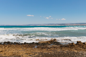 beautiful azure sea and pebble beach. High quality photo