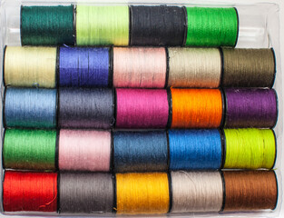 A set of colored threads on the coils