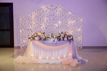 flower decor on a wedding table in a restaurant