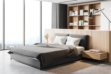 White master bedroom corner with bookcase