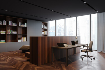 Grey home office interior with bookcase