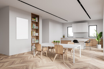 White kitchen corner with bar, table and poster