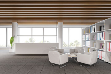 White reception desk and waiting room interior