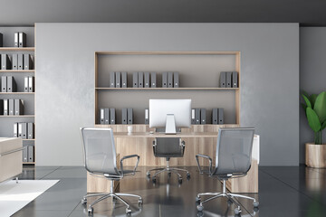 Gray and wooden CEO office with bookcase