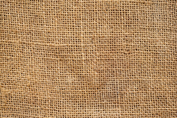 Brown sackcloth texture. or Background of Natural Brown Fabric Sack weaving is a bag. For packing