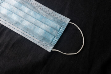 Background concept for news about the novel coronavirus COVID-19 pandemic, antiviral medical mask...