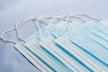 Background concept for news about the novel coronavirus COVID-19 pandemic, antiviral medical mask...