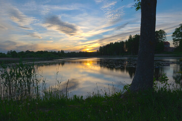 colorful sunset landscape on the lake