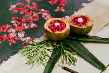 Rose blossom, Petals in coconut bowl, red flowers, candles, Beauty background