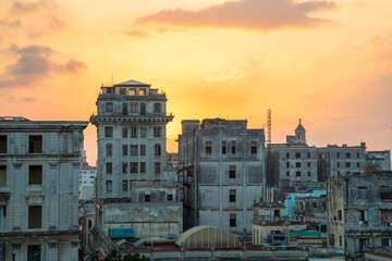 Fototapeta na wymiar Sunset over buildings central Havana