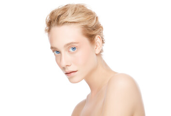Young beautiful blonde woman with blue eyes standing with naked shoulders, concept of perfect clean female skin care and beauty, isolated on white