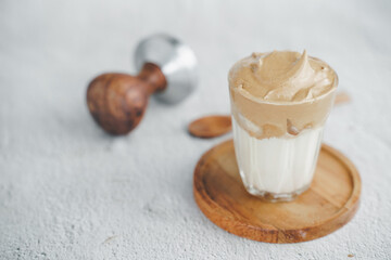Iced Dalgona Coffee, a trendy fluffy creamy whipped coffee. Summer iced coffee.with copyspace for your text.