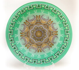 Green decorative glass dish on white background
