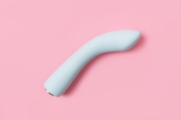 on a pink background sex product, toy for adults
