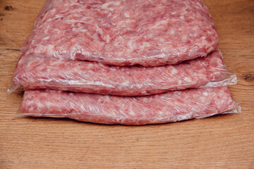 Packaged pork minced meat. Homemade meat semi-finished products. Minced pork. Semi-finished products in a refrigerator storage bag