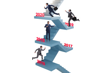 Fototapeta na wymiar Businessman climbing stairs on yearly basis