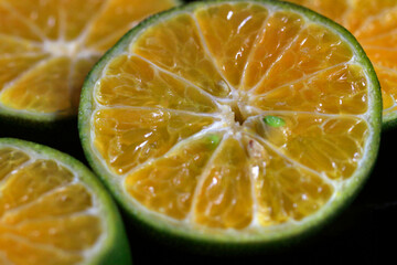 sliced orange on green