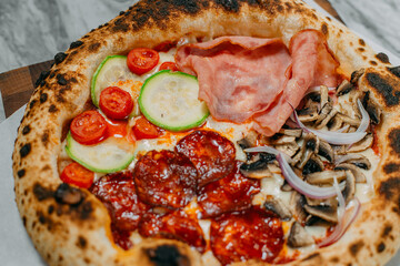 hot italian pizza on marble table