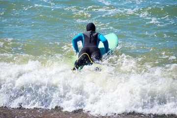 Active women with surfboard enjoy water sport at vacation holidays.