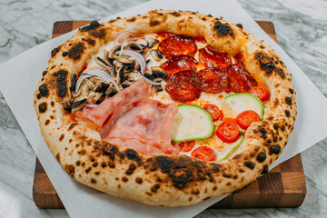 hot italian pizza on marble table