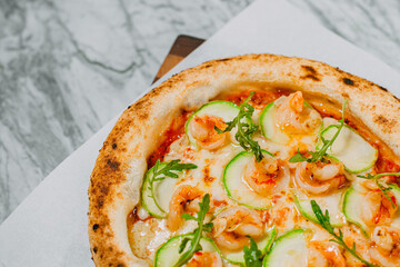 hot italian pizza on marble table