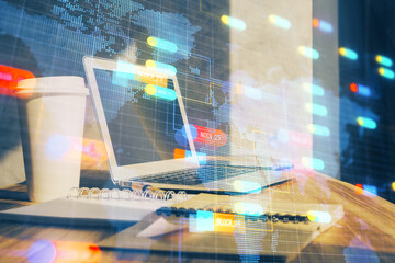 Double exposure of desktop computer and technology theme hologram. Concept of software development.
