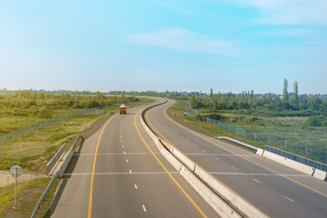 Road panorama on sunny spring day with lovely sky.