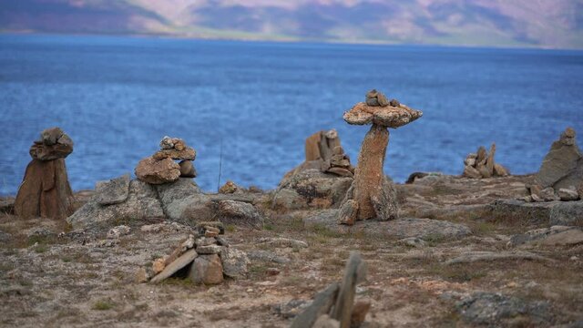 Sacred stone pyramides on the shore of Lkae Baikal on Olkhon island, Siberia, Russia