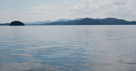 Sea surface mountain and sky
